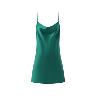 Green satin slip dress on a white background