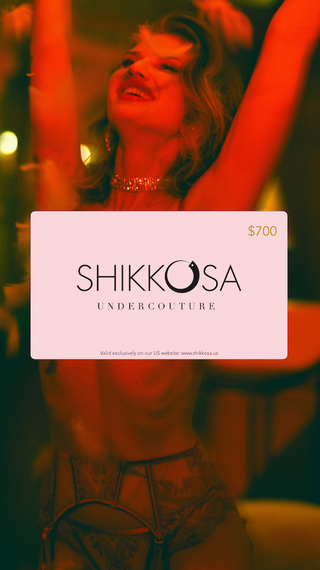 Woman in a dimly lit setting with a Shikkosa Undercouture gift card overlay.